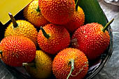 Thailand, Locals sell fruits, food and products at Damnoen Saduak floating market near Bangkok 